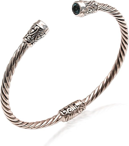 NOVICA Artisan Crafted Sterling Silver Blue Topaz Cuff Bracelet | Faceted Stone | Adjustable Cuff Design | Hypoallergenic Jewelry | Lead & Nickel Free | Indonesia ' Spiral Temple' 6 in. L (end to end)