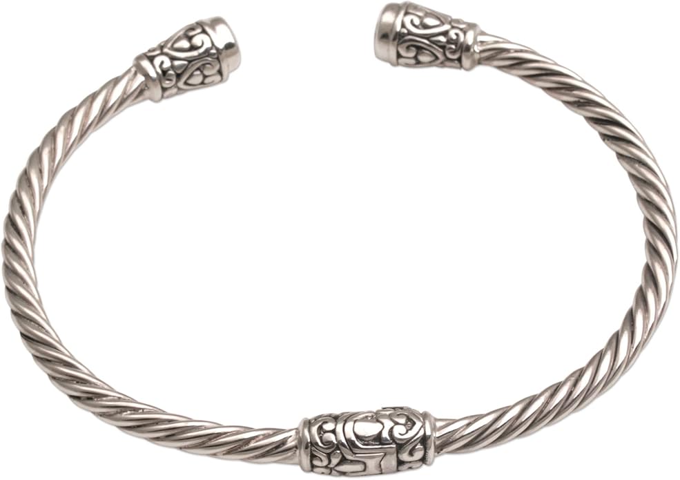 NOVICA Artisan Crafted Sterling Silver Blue Topaz Cuff Bracelet | Faceted Stone | Adjustable Cuff Design | Hypoallergenic Jewelry | Lead & Nickel Free | Indonesia ' Spiral Temple' 6 in. L (end to end)