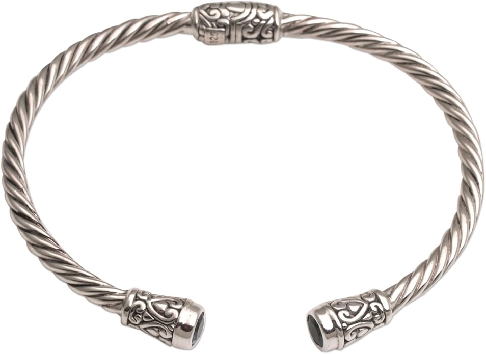 NOVICA Artisan Crafted Sterling Silver Blue Topaz Cuff Bracelet | Faceted Stone | Adjustable Cuff Design | Hypoallergenic Jewelry | Lead & Nickel Free | Indonesia ' Spiral Temple' 6 in. L (end to end)