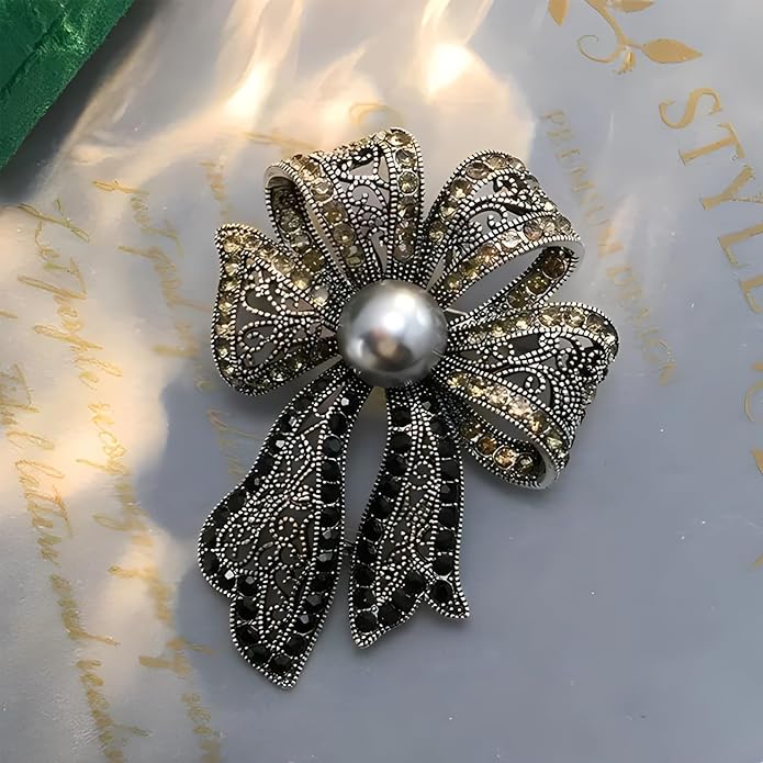 Elegant Vintage Silver Metal Bowtie Brooch with Black Pearl Accent - A Timeless Treasure for Every Occasion
