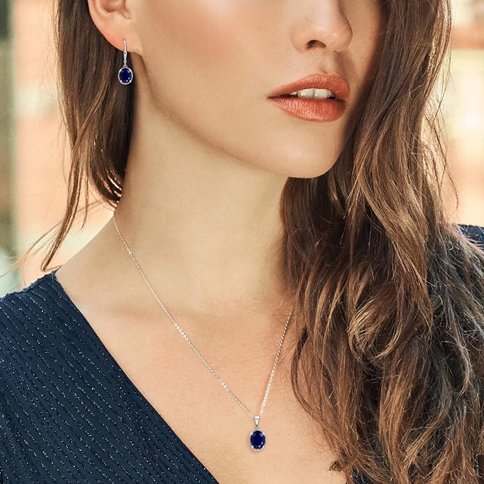 Gem Stone King 925 Sterling Silver Blue Sapphire Pendant and Earrings Jewelry Set For Women (8.90 Cttw, Gemstone Birthstone, Oval 11X9MM and 9X7MM, with 18 Inch Silver Chain)