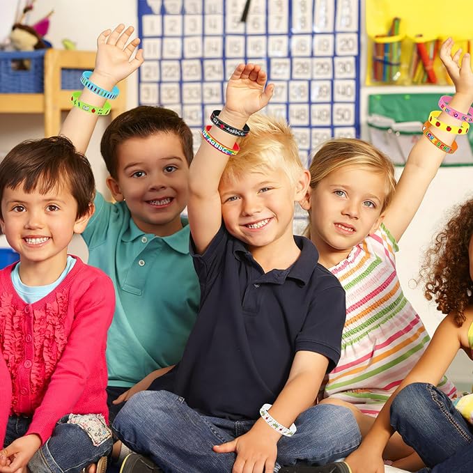 JUNEBRUSHS 64Pcs Welcome Back to School Party Favors Silicone Bracelets Rubber Wristbands for First Day of School Party Decorations Kindergarten Preschool Favors Supplies(8 Designs)