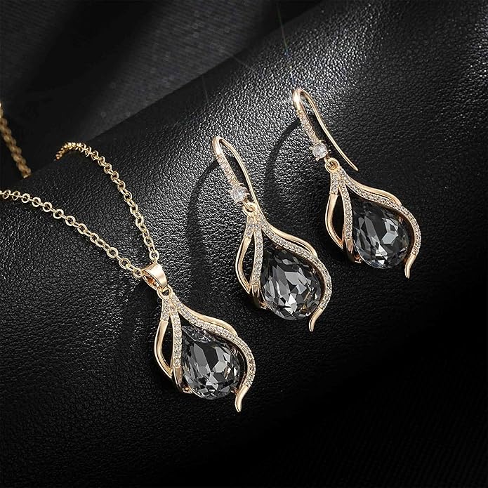 EVEVIC Austrian Crystals Teardrop Hollow Twisted Pendant Necklace Earrings for Women 14K Gold Plated Halo Drop Dangle Earrings Hypoallergenic Jewelry Set