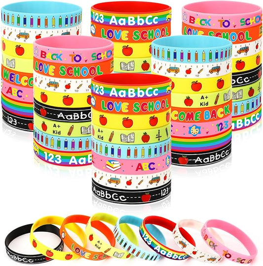 JUNEBRUSHS 64Pcs Welcome Back to School Party Favors Silicone Bracelets Rubber Wristbands for First Day of School Party Decorations Kindergarten Preschool Favors Supplies(8 Designs)