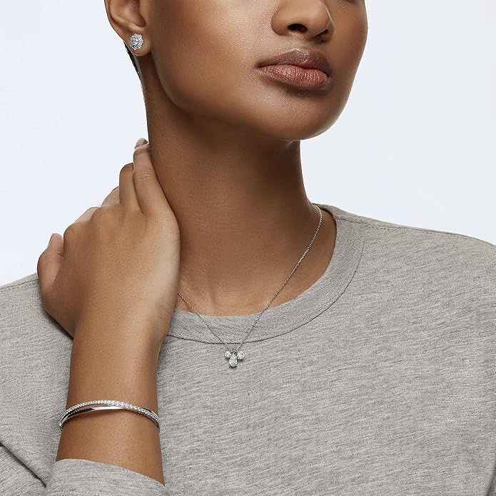 SWAROVSKI Twist Rows Crystal Bracelet Collection, Rhodium & Rose Gold Tone Finish, Clear Crystals